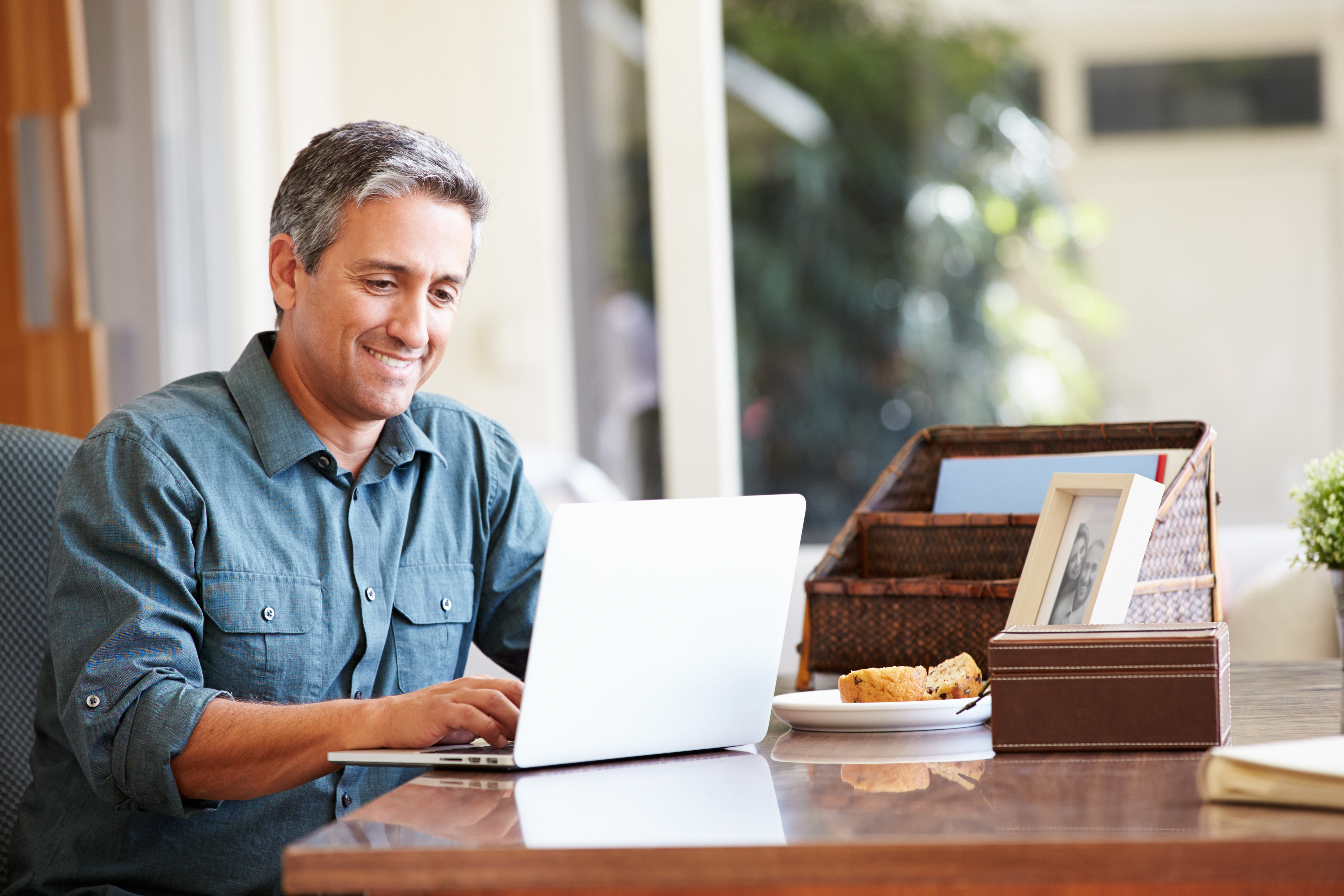 Hispanic Man on Computer