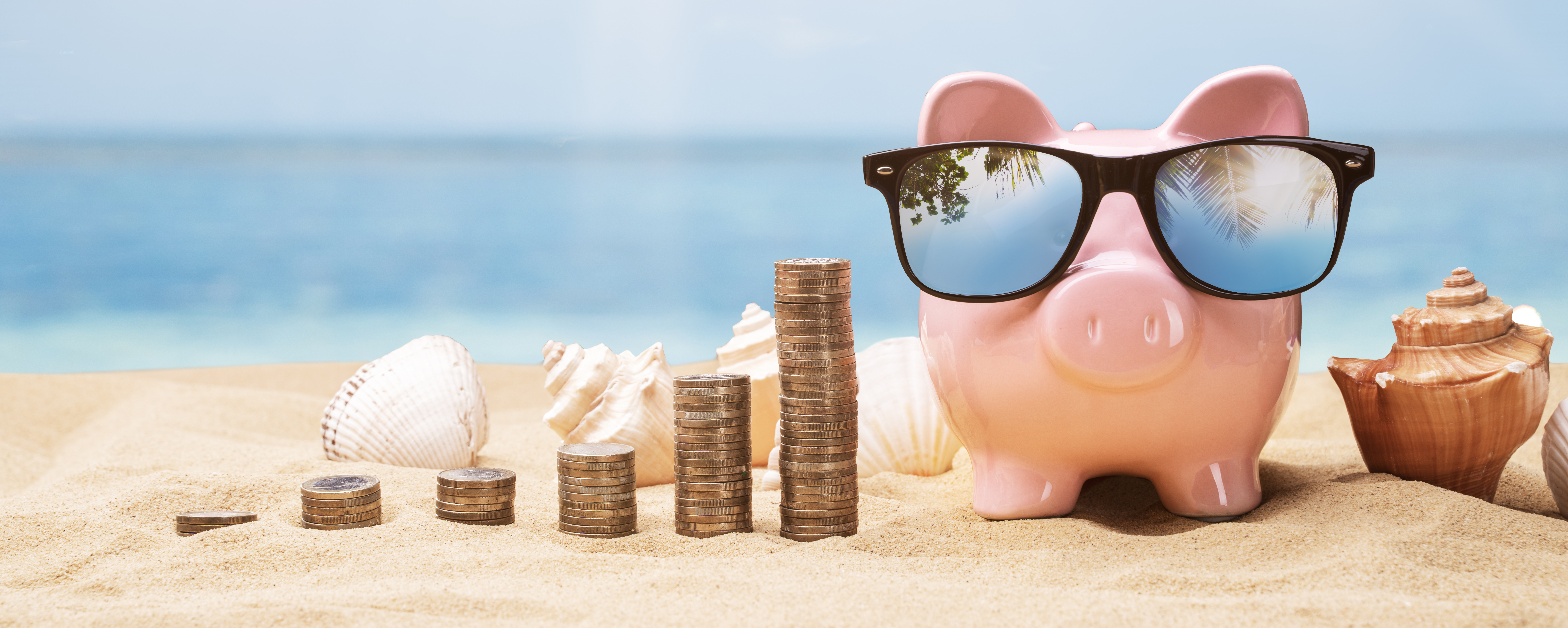 piggy bank on the beach
