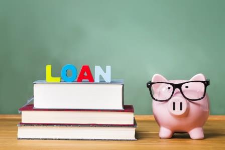Word Loan on Books with Piggy Bank