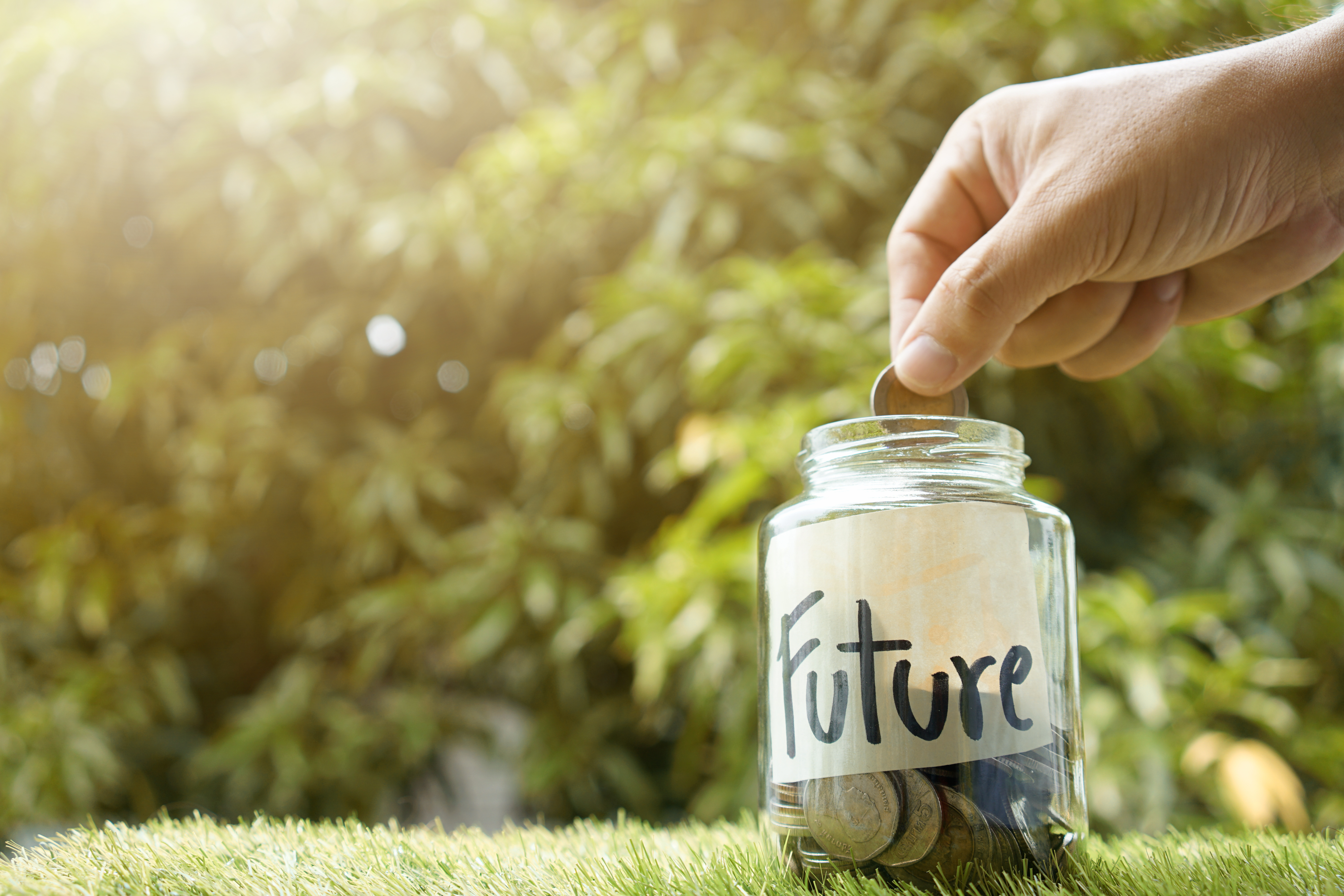 jar of coins with future written on it.