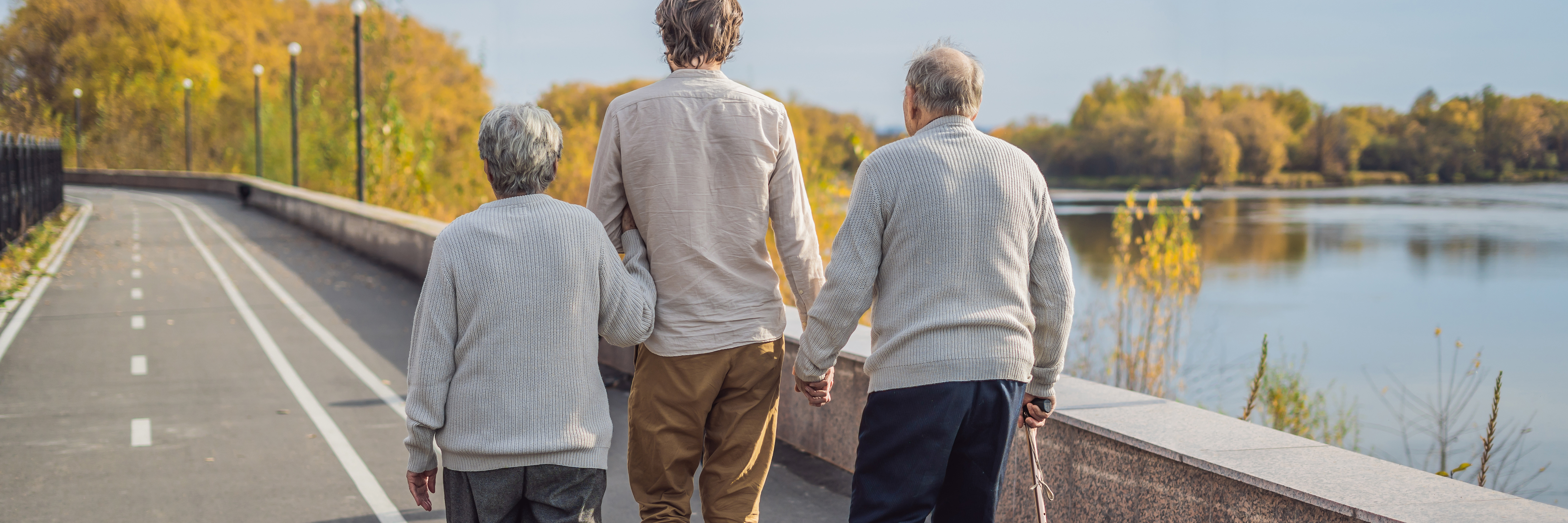 Elderly Couple Walking over Bridge